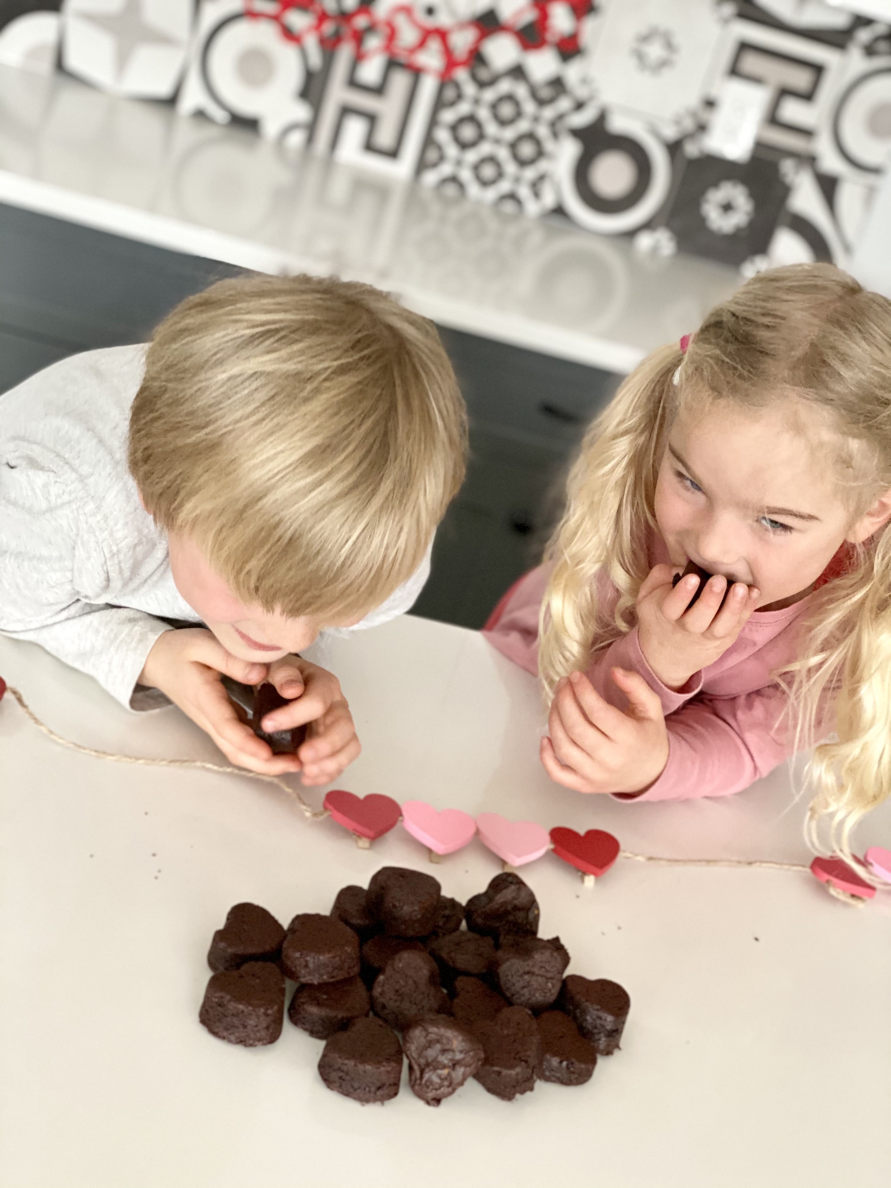 Eat Your Heart Out Brownies 2 kids enjoying heart-shaped brownies